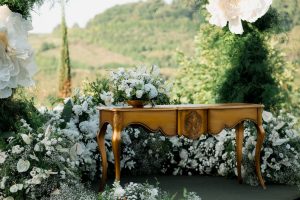 Charming outdoor wedding setup with elegant floral decor and vintage wooden table. — A Guide To Help You Select The Right Mat