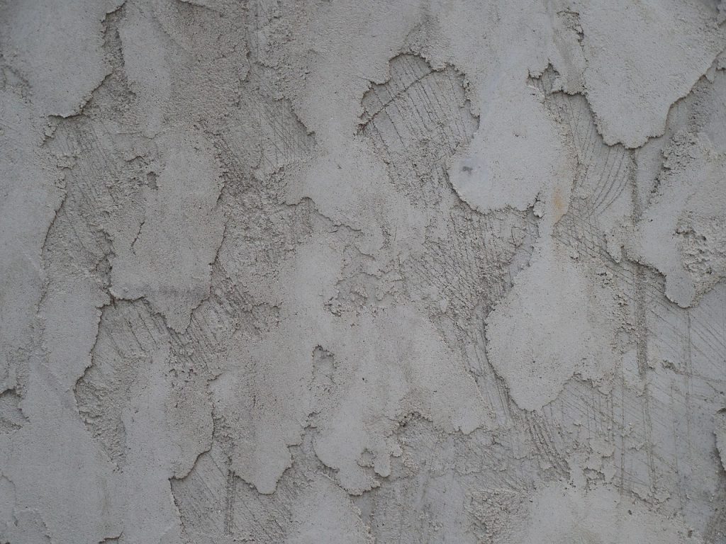 Background, stucco, wall — Common Issues That Require Plumbing Excavation