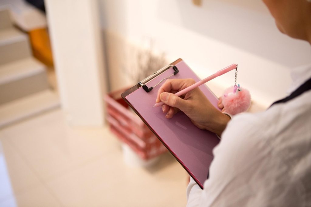 Writing, beautiful flowers, pencil — Emergency Roofing Services in Frederick, MD