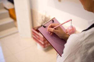 Writing, beautiful flowers, pencil — Emergency Roofing Services in Frederick, MD