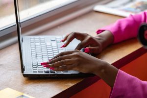 Laptop, typing, working — High Quality, Affordable Pressure Washing Solutions for Atlanta Homes