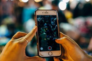 Iphone, screen, taking photos — How to Sell White Label Facebook Ads Services to Your Clients