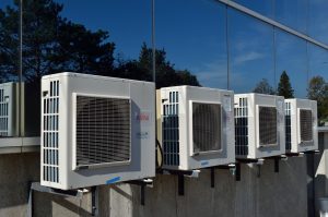 Air conditioner, global warming, summer — The Role of Professional Maintenance in HVAC Longevity and Efficiency