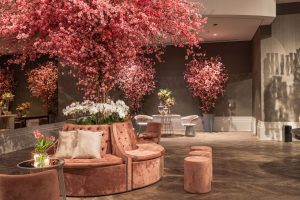 Elegant indoor lounge featuring cherry blossom decorations and plush seating for a sophisticated ambiance. — Transform Your W