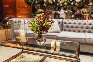 Luxurious living room featuring a glass table with stylish decor and a plush sofa. — Versatile Panels for Walls to Transform