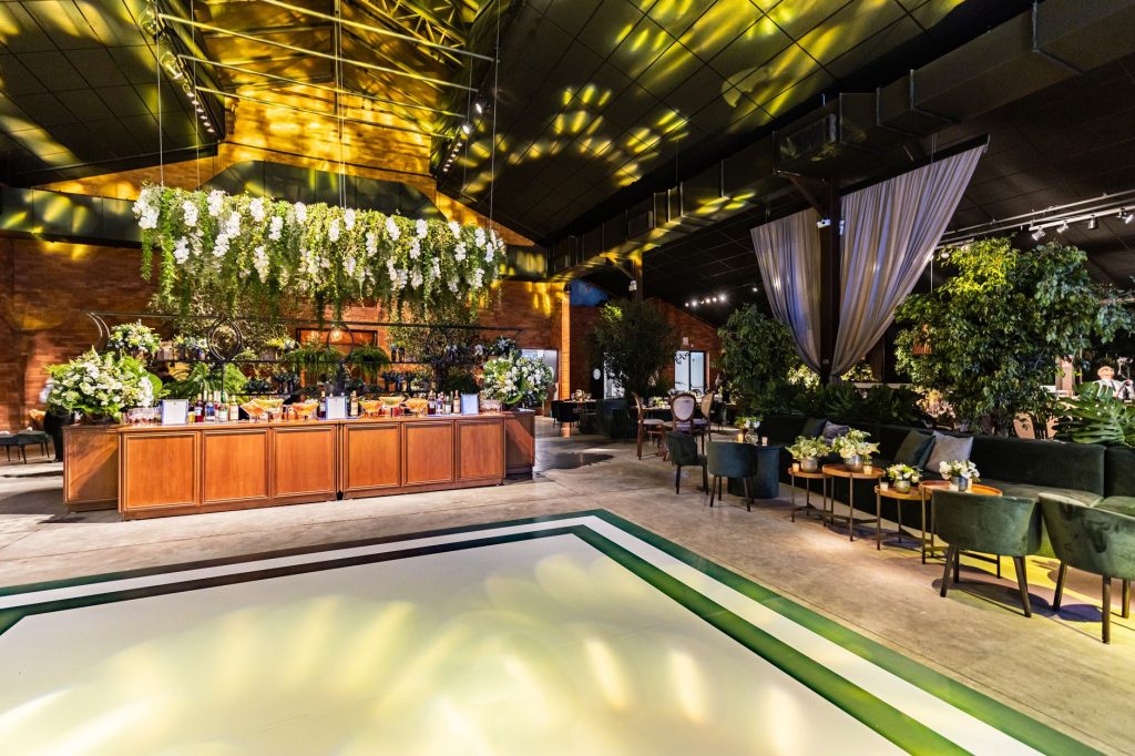 A modern banquet hall with elegant floral arrangements and ambient lighting, perfect for celebrations. — Which Is The Right B